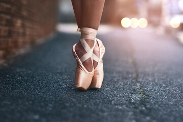 Ballet, shoes and street with dancer outdoor for theater performance, recital or rehearsal closeup. Asphalt, balance and dance with ballerina person on road or sidewalk in alley for art and talent