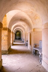 Obraz premium Walkway under the seven-arched Praeneste at Rousham House Gardens