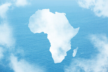 Obraz premium Africa map made of white puffy clouds on blue ocean