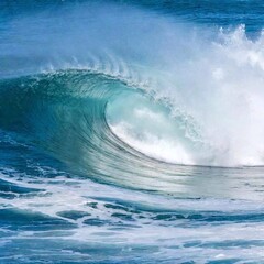 Close-Up Photo of a Wave Curling Before Breaking: A close-up shot capturing the precise moment a wave curls before it crashes down. Deep focus reveals the intricate patterns of the water as it moves