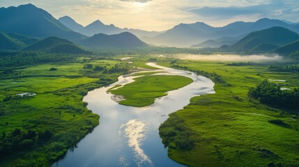 Fototapeta premium Serene river valley at dawn a breathtaking natural landscape