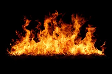 Fototapeta premium Dramatic flames against a black background