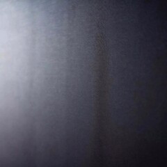 A black screen with a dotted texture, creating a minimalistic, modern look