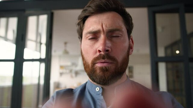 Point of view webcam frustrated Caucasian man father typing mobile phone display stressed male dad chatting on social media online touchscreen upset guy receiving bad information loss at home problem