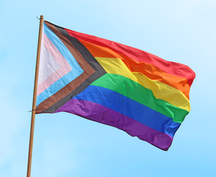 Sydney, NSW Australia - January 16 2023: Pride flag blowing in the wind, The symbol of Gay, Lesbian, Bisexual and Transgender, LGBT community, Social movements