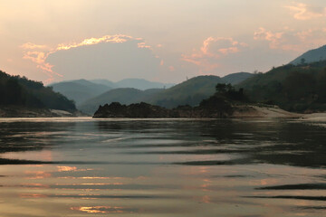 View from the slow boat from Thailand to Laos after sunset, Laos