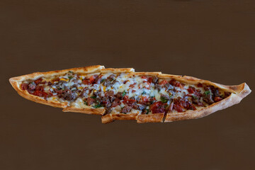 Pita with cheese and cubed meat.