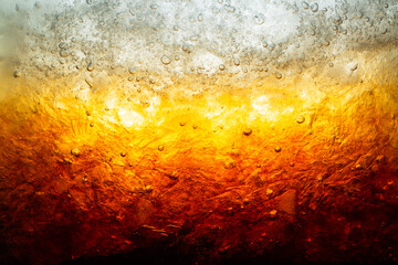 Macro cola and ice texture,Cola with Ice. Food background ,Cola close-up ,design element. Beer...