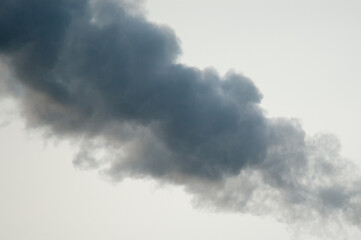The photo shows gray smoke on a gray background