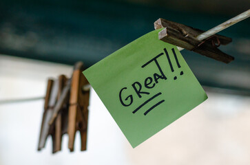 Motivational Word In A Green Square Paper Outdoor Composition