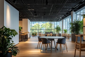 Modern office interior with large windows, wood floor, plants, and a table with chairs.