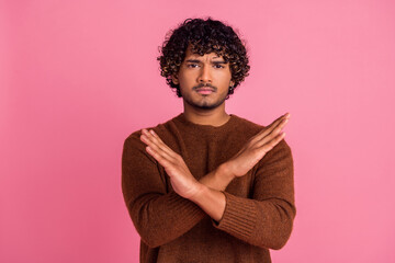 Photo of confident serious man wear trendy brown clothes crossed arms isolated on pink color...