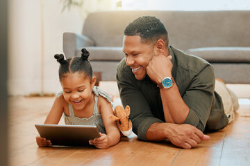 Father, kid and tablet on floor in home for playing games, watching online cartoons and bonding...