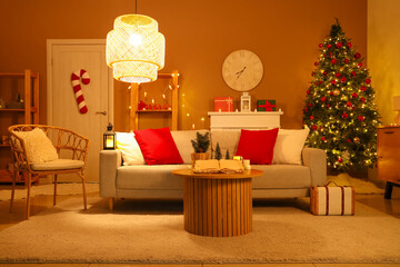 Interior of dark living room with opened old book on coffee table and Christmas decorations. Christmas story concept