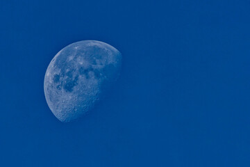 Full moon photographed with a telephoto lens.