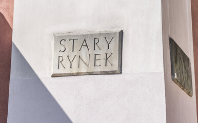 Stary Rynek Street Sign Carved in Stone in Poznań, Poland