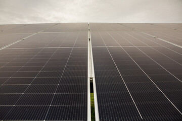 Photo of solar panels. Solar energy production. Electric current from renewable sources.
