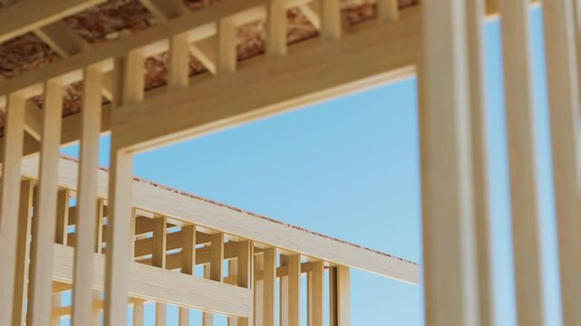 Conceptual video of a frame house under construction. 