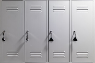 White metal lockers with padlocks