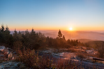 Sunrise from Lysa hora hill in Moravskoslezske Beskydy mountains in Czech republic