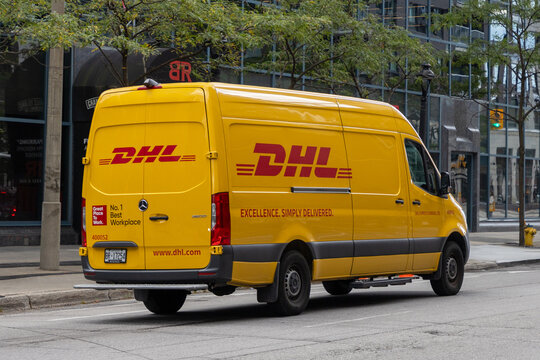 Ottawa, Canada - October 1, 2024: Yellow DHL delivery van on the road