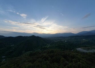 Obraz premium aerial view of the Prosecco hills landscape under a clear sky at sunset in Treviso, Veneto, Italy