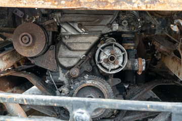 Rusty old engine showing damage and corrosion