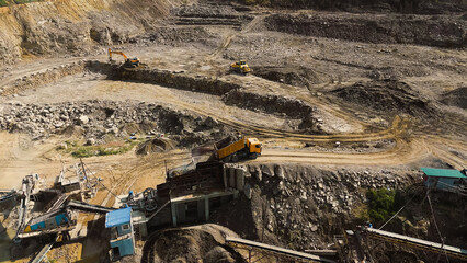 Fototapeta premium the work of the quarry for the extraction of crushed stone and asphalt processing