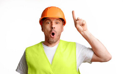 Great Idea. Builder Worker Pointing Finger Up Having Eureka Moment Planning Project Standing On White Studio Background, Looking At Camera. Building Ideas, Plans And Solutions Concept