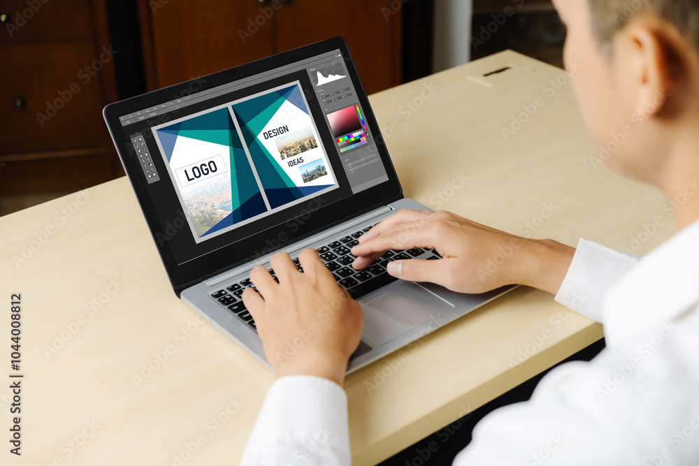 Poster graphic designer software for modern design of web page and commercial ads showing on the computer s