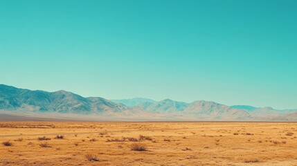 A shimmering mirage appears over the parched landscape as the sun sets on the horizon