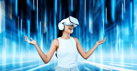 Female standing and wearing white VR headset and white sleeveless connect metaverse, future...