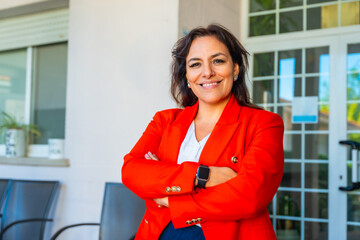 Portrait of a director of a senior center standing outside