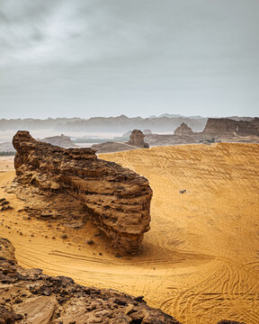 Aerial shot of rock formation in a rocky desert