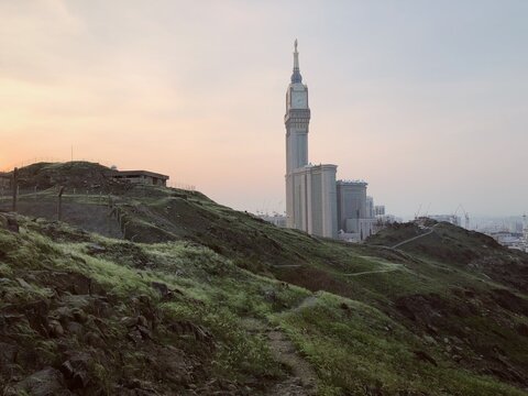 View of the Clock Towers in Mecca province surrounded with lush greenery, Saudi Arabia