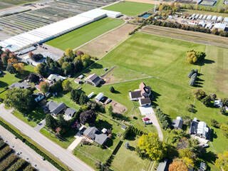 Aerial over Martindale and Louth, an agricultural area of north St. Catharines, Ontario, Canada near Lake Ontario and the Port Dalhousie area, on a sunny Autumn day in October, 2024.