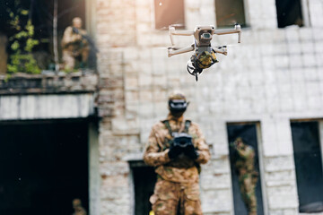 Soldier UAV operator launches army drone with bomb to drop into enemy fortifications and trenches....