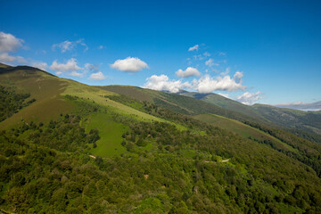 Typical mountainous landscape of the Saja-Besaya natural park in Cantabria, Spain, with rolling...