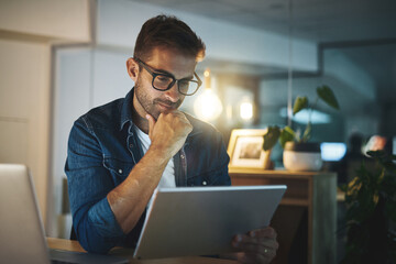 Office, reading and man with tablet, laptop and business ideas for online project agency at night. Thinking, dark and consultant with digital app for web review, article and research report at desk