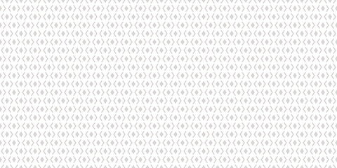 Abstract geometric seamless pattern. Subtle vector background. Simple ornament with small rhombuses, diamond shapes, mesh, grid. White and gray minimal ornamental texture. Repeated modern geo design