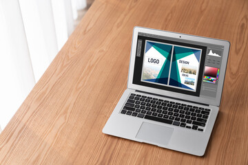 Fototapeta premium Graphic designer software for modern design of web page and commercial ads showing on the computer screen