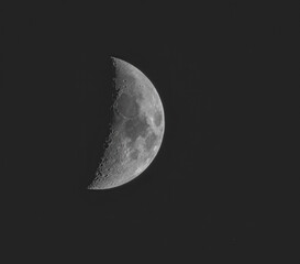 Clear crescent moon on a dark night over the Atlantic Ocean near the Azores Islands