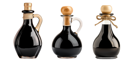 Glass bottle with cork and handle, filled with dark vinegar isolated on a white transparent background. Concept of condiments.
