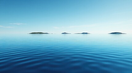 Clear skies over calm blue sea with distant islands