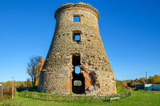 The ruins of a limestone mill on a sunny October day, in the village of the First of May in the Kingisepp district of the Leningrad region.