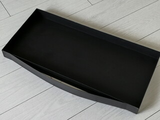 A subject photo shoot of black grilles for fireplaces.