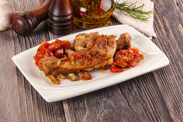 Baked lamb ribs with vegetables
