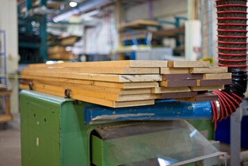 Stack of Wooden Boards in a Workshop