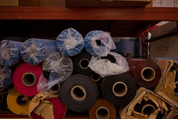 Colorful Rolls of Fabric in Storage