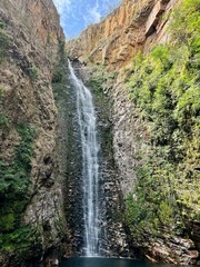 Waterfall over forest